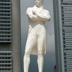 here lies statue of raffles. sit on the island of singapore almost 200 years ago when he came to the island