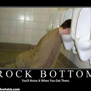 normal demotivational posters rock bottom