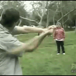 Some dude gets hit by a baseball bat.