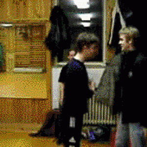 Funny guy crashing in a wall.