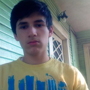 Me, on the porch of our house. Taken this year.