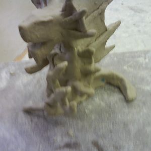 this is the second time I worked on my clay thingy :D
its flashy because some one was bashing on the table ><