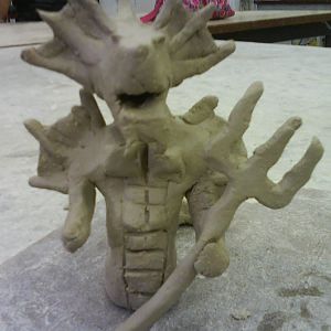 this is the second time I worked on my clay thingy :D
its flashy because some one was bashing on the table ><