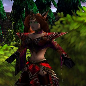 A blood elf villager in a park.