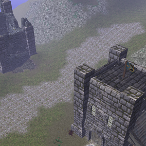 A couple of towers, one of which has been ruined by enemies