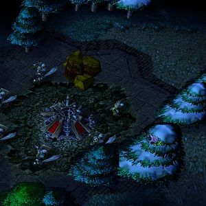 Screenshot showing how zombies start, and their 'blight' beneath them. The blight grows when new buildings are placed.
