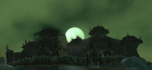 Full Moon reveals the Thunder Axe Fortress in Desolace against a late nights sky.