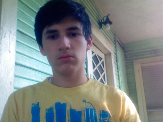 Me, on the porch of our house. Taken this year.