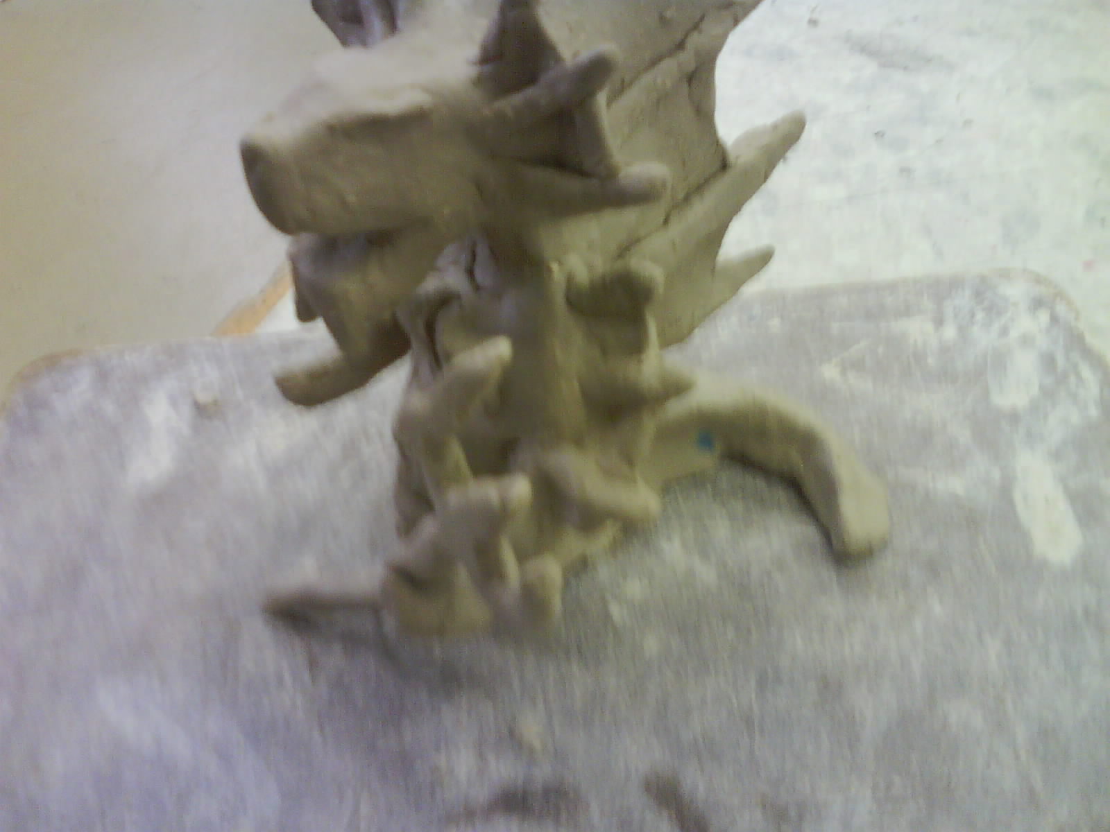 this is the second time I worked on my clay thingy :D
its flashy because some one was bashing on the table ><
