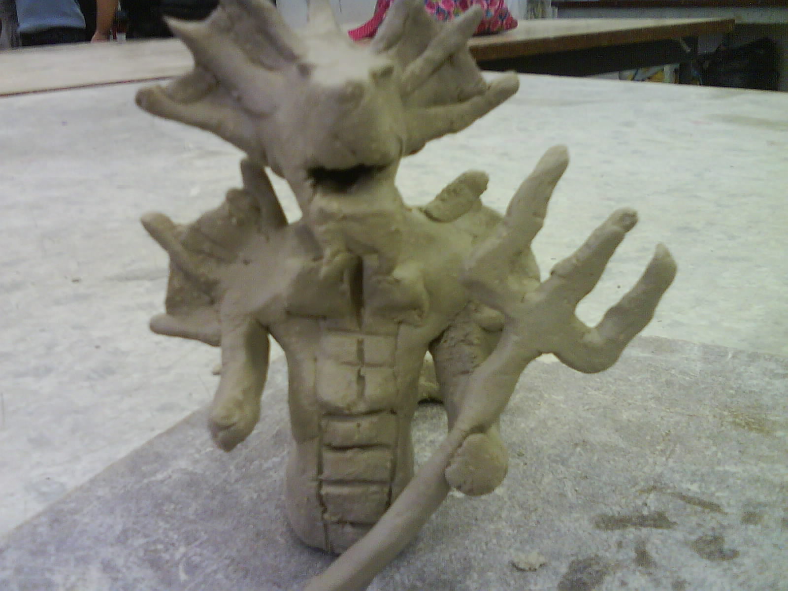this is the second time I worked on my clay thingy :D
its flashy because some one was bashing on the table ><