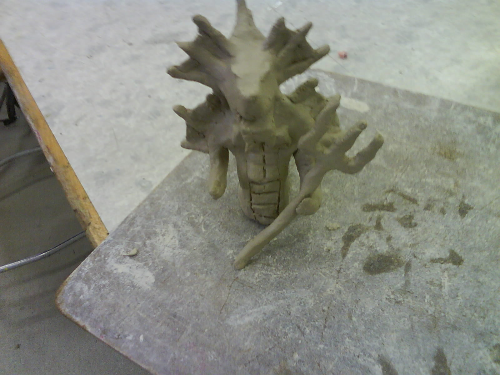 this is the second time I worked on my clay thingy :D
its flashy because some one was bashing on the table ><