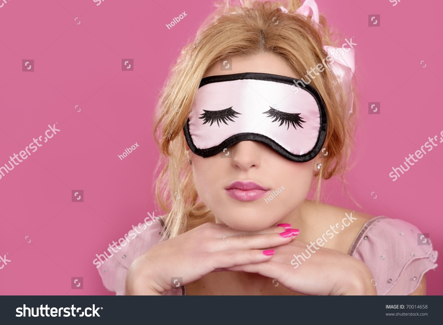 stock-photo-sleep-mask-blind-blonde-relaxed-on-pink-background-portrait-70014658.jpg