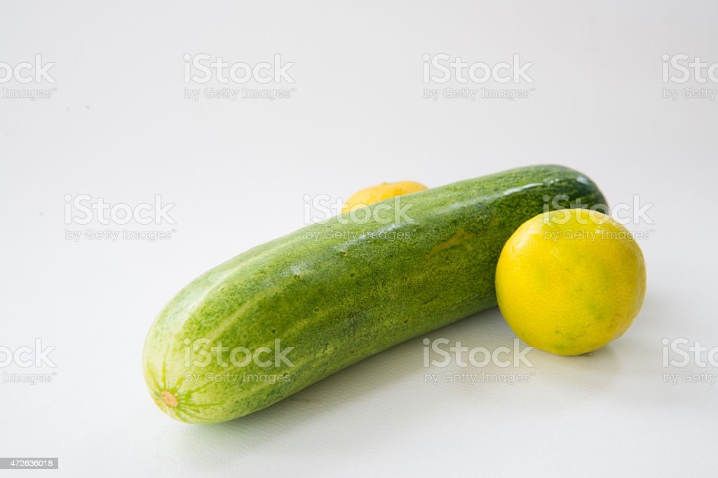 lemon-and-cucumber-in-penis-shape-picture-id472636018