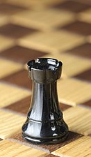 131px-Chess_piece_-_Black_rook.JPG