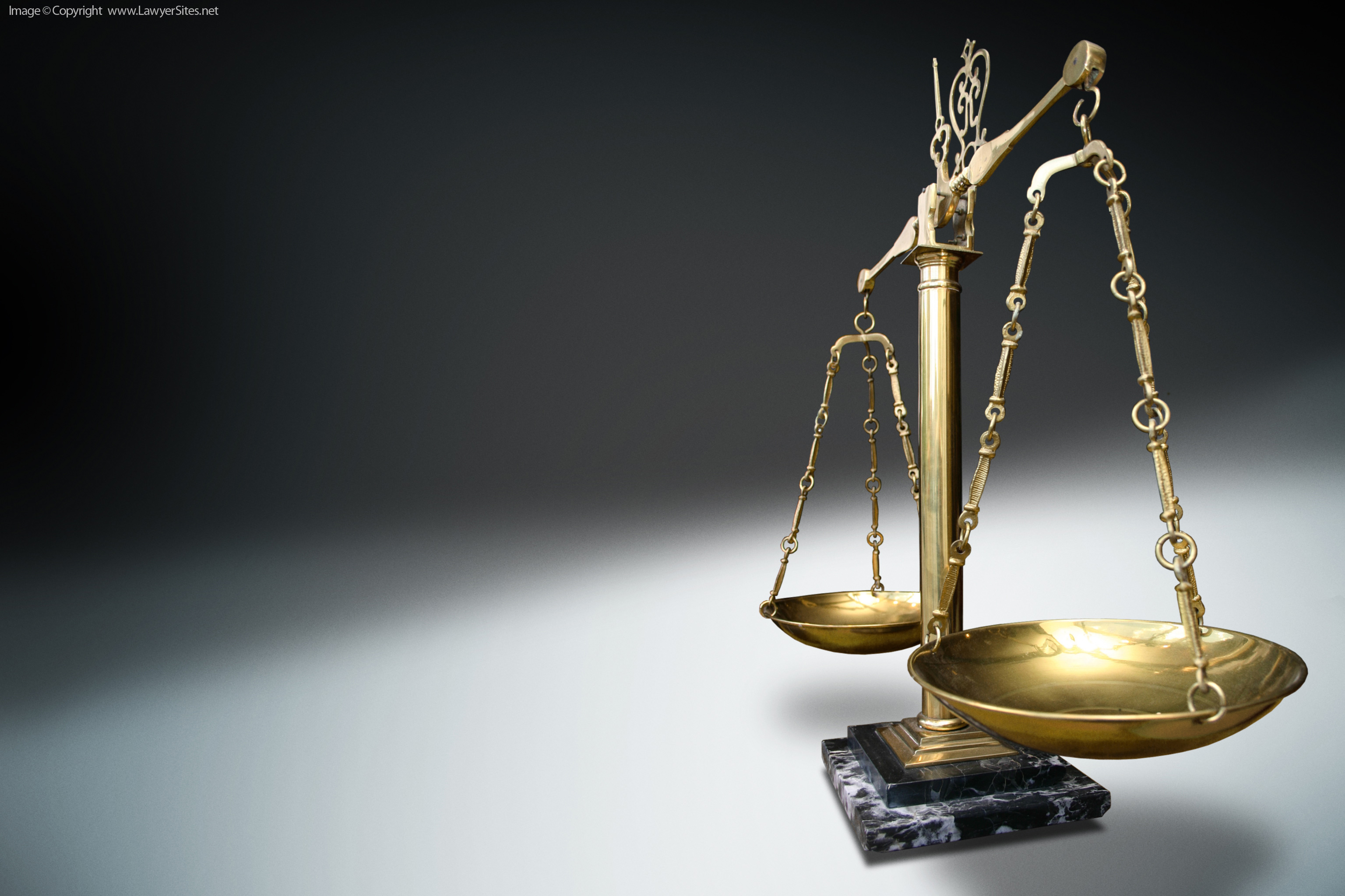 scales-of-justice-stock-photo.jpg
